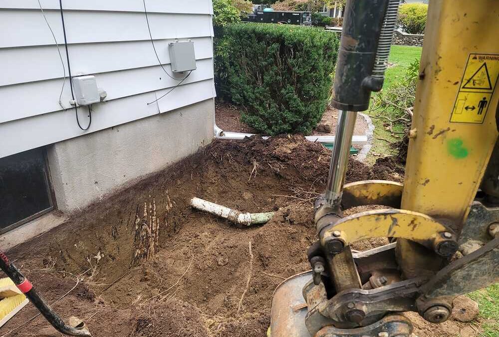 sewer line excavator and pipe installed